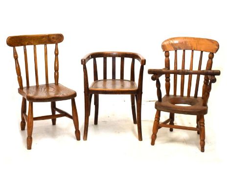 Early 20th Century child's bentwood armchair, child's beech and elm seat stick back chair and a child's Windsor style commode