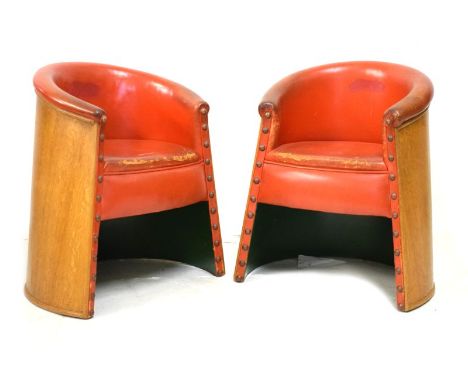 Advertising Interest - Clarks Shoes - Pair of vintage shop fitting oak and red hide upholstered tub chairs, the seat backs wi