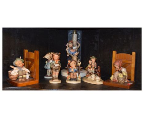 Goebel Hummel figural table lamp, pair of bookends, and four other figure groups  