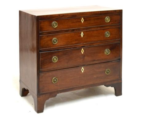 Late George III mahogany chest of drawers, of small proportions, the rectangular top over four cockbeaded graduated long draw