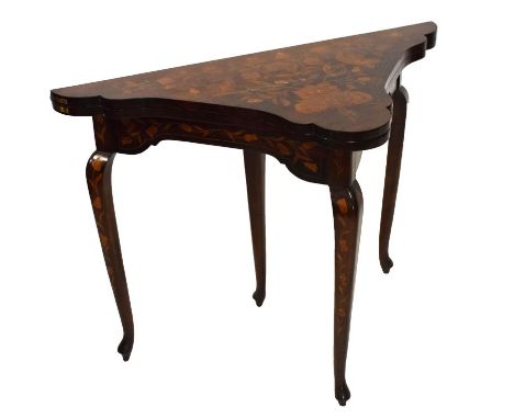 19th Century Dutch marquetry fold-over games table, the shaped triangular top inlaid with flowers enclosing a chess board and
