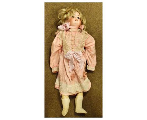 Armand Marseille vintage 20th Century German bisque headed doll marked 390 to neck, clothed in pink dress  