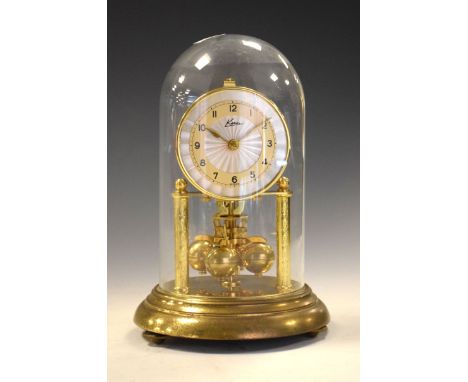 Mid 20th Century German 400-day Anniversary or torsion clock with glass dome and original booklet  