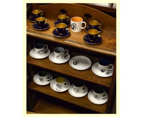 Set of six Royal Worcester demi-tasse coffee cups and saucers with blue and gilt decoration with gilt interiors, pattern C255