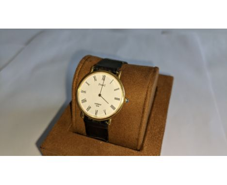 Piaget vintage yellow gold watch on leather strap. Priced (used) at £1,595. It appears to be in yellow gold &amp; has a diame