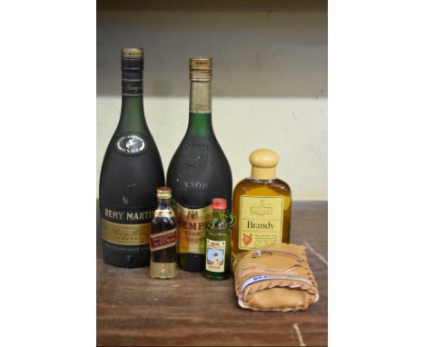 A 68cl bottle of Remy Martin VSOP cognac; together with a 70cl bottle of Sempe armagnac; an 18cl bottle of Ascot brandy, in l