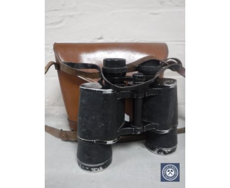 A set of vintage leather cased Hedler 10x50 field glasses