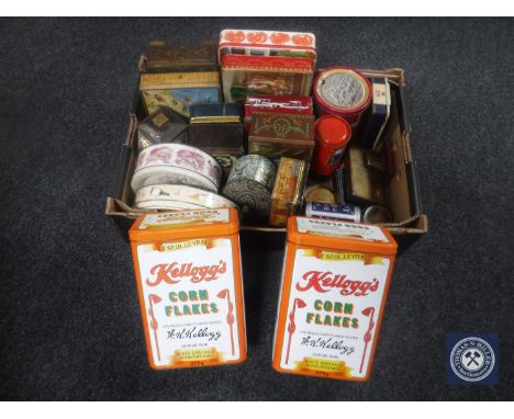 A box containing a quantity of vintage tins including two French Cornflakes tins