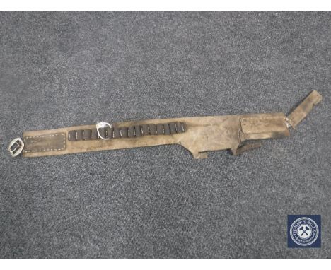 An antique hand-stitched leather ammunition belt