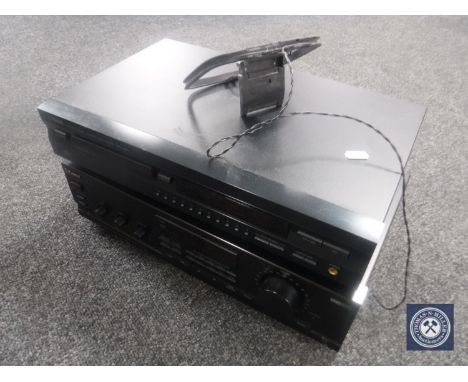 A Yamaha DDX-496 compact disc player, Sherwood RX-2030R receiver, box of speaker wires 