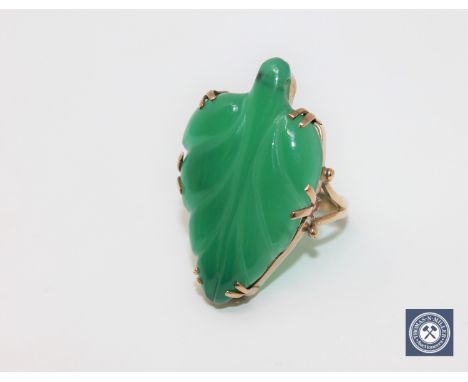 A high carat gold green jade set ring, size Q1/2