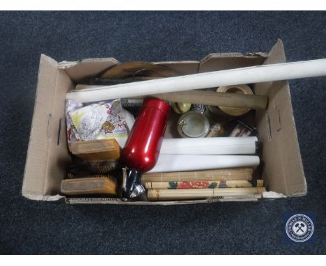 A box containing rolled maps, hand fans, White Horse Whisky coat hanger, book ends, vintage soda syphon and sparklettes 