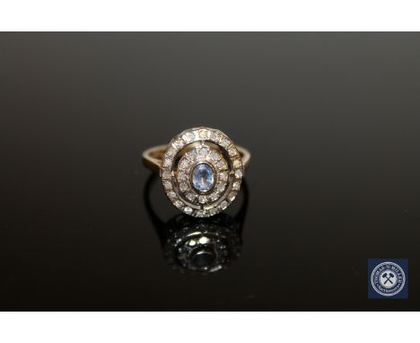 A 9ct gold sapphire and diamond cluster ring, size P