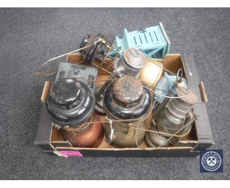 A box of vintage Tilley lamps and lanterns 