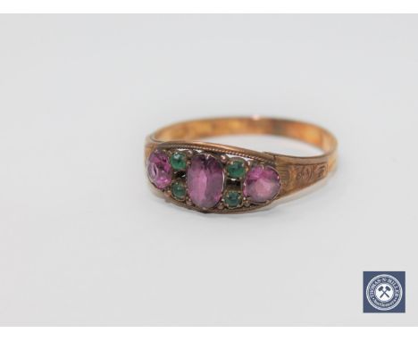 A Victorian 15ct gold amethyst and emerald ring, size S1/2