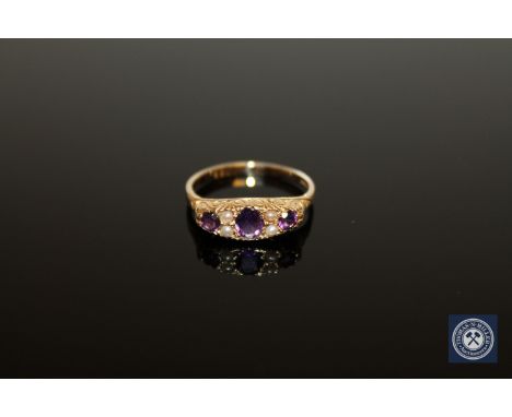 A 9ct gold amethyst and pearl ring, size O