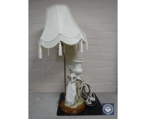 A Spanish pottery figural table lamp with shade, lady with rose