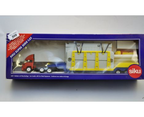 SIKU 1:55 SCALE LOW LOADER WITH CAR WASH EQUIPMENT WITH BOX (GC)