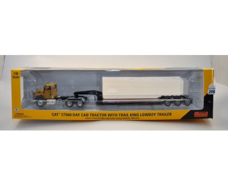 CAT 1:50 SCALE CT660 DAY CAB TRACTOR WITH TRAIL KING LOWBOY TRAILER NORSCOT SCALE MODELS WITH BOX (GC) 