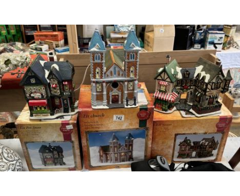3 boxed Luminco lit Christmas pottery buildingsAll in good condition and all light up.