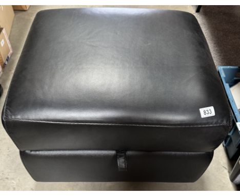 A large foot stool pouffe with storage box