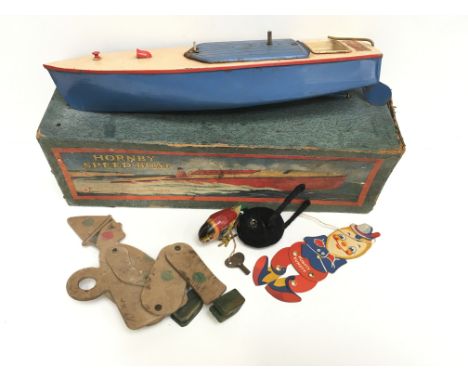 Hornby Speed Boat No.2 'Swift', clockwork model with blue hull and engine cover, rudder (lacks propeller) and cream deck. Len