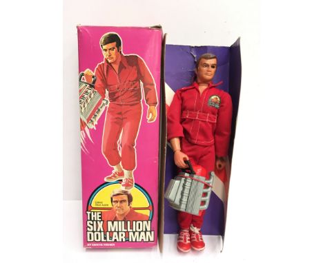 Denys Fisher 'The Six Million Dollar Man' Colonel Steve Austin action figure in red jumpsuit. Appears VG with Engine Block in