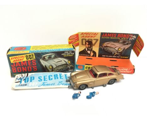 Corgi Toys 261 James Bond Aston Martin DB5, c.1965-69: gold body with red interior, wire wheels, working features and suspens