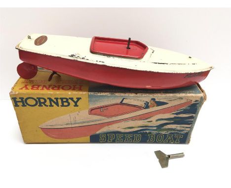 Hornby Speed Boat 'Flash': clockwork tinplate boat with red hull/engine cover, cream deck, Hornby and 'Flash' decals. Length 