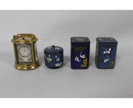 A SMALL HALCYON DAYS ENAMEL CARRIAGE CLOCK, decorated with enamel panels of floral sprays, together with three small cloisonn
