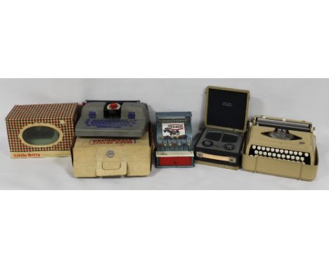 A BOXED MARX DE LUXE TYPEWRITER, a boxed 'Little Betty' miniature sewing machine, a pressed steel cash register, a Vidor 'My 