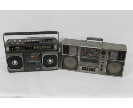 A VINTAGE SANKEI MODEL TCR-939 CASSETTE RADIO RECORDER and a Sanyo Model M9835L cassette radio recorder  (2)