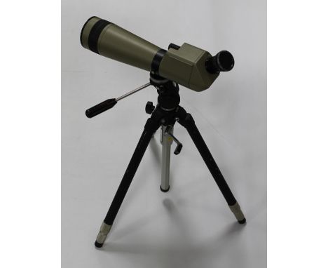A KOWA TSN-1 SPOTTING SCOPE WITH 20x - 60x ZOOM EYEPIECE, on Slik tripod stand