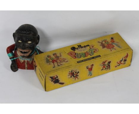 A DIECAST MECHANICAL MONEY BOX A/F TOGETHER WITH A BOXED PELHAM PUPPET LS 'MEXICAN GIRL'
