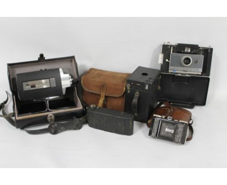 TWO TRAYS OF CAMERAS AND FILM RELATED EQUIPMENT, to include vintage film cameras, a Bell and Howell Super 8 Camera, etc 