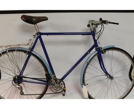 A VINTAGE TOURING BICYCLE WITH A MIXTURE OF VINTAGE COMPONENTS INCLUDING CAMPAGNOLO. The frame having been re-sprayed, with C