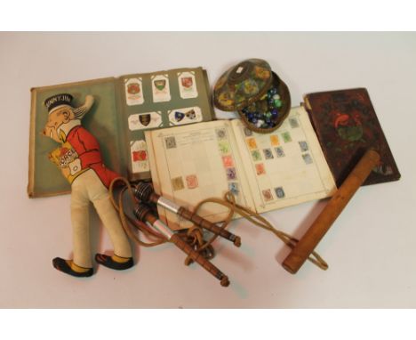 A TRAY OF COLLECTABLES TO INCLUDE A FLOATING DIARY THERMOMETER, two albums of minor stamps, marbles etc