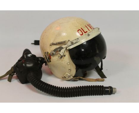 A VINTAGE US AIR FORCE "P1-a" FLYING HELMET AND FACE MASK, skull cap with later paint and name 'Oliver' across the front