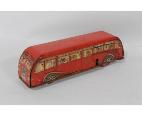 A TINPLATE CLOCKWORK  B.M.M.O MIDLAND RED MOTOR SERVICES SINGLE DECK COACH, with lithograph passenger illustration windows (p