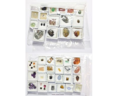 A quantity of loose gemstones including amethyst, tiger's-eye, rock crystal with needle like inclusions, various agates inclu