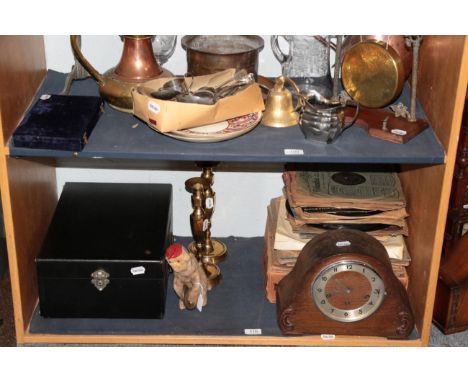 Four various mantel clocks including a late 19th century walnut cased musical clock; a travel record player and records; a pa