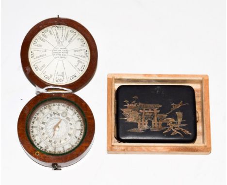 A 19th century cased pocket compass/sundial and Japanese metalwork matchcase, in wooden box (2)