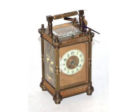 A brass striking and repeating carriage clock