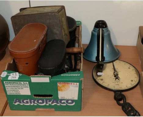 A megaphone and a box of binoculars etc