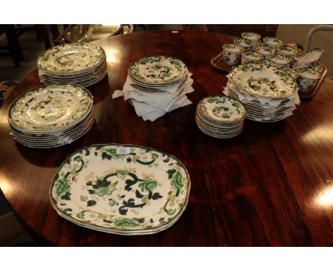 A Masons Ironstone 'Chartreuse' pattern dinner and tea service comprising: eleven cups; twelve saucers; twelve soup plates; s