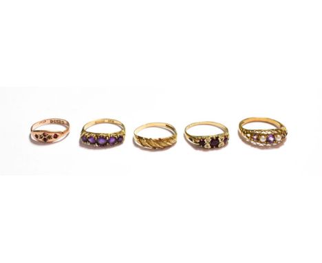 A textured 9 carat gold ring, finger size P; a 9 carat gold amethyst and seed pearl ring, finger size O1/2; and three 9 carat