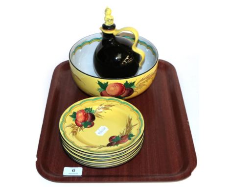 A large Mintons Secessionist fruit bowl, tubelined fruit and foliate sprays on yellow ground, 22cm diameter; together with a 