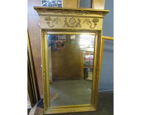 A vintage mirror with plaster frame, painted gold 115x72cm approx