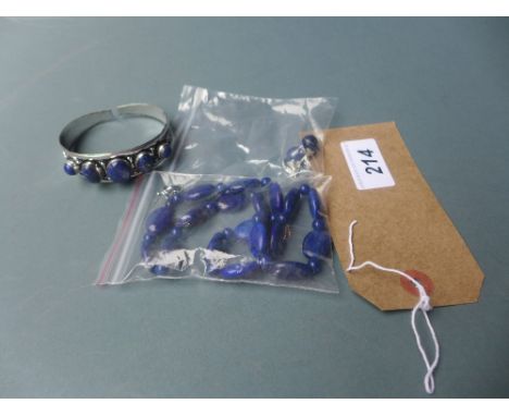 A suite of Lapis Lazuli jewellery including necklace earrings and bangle 