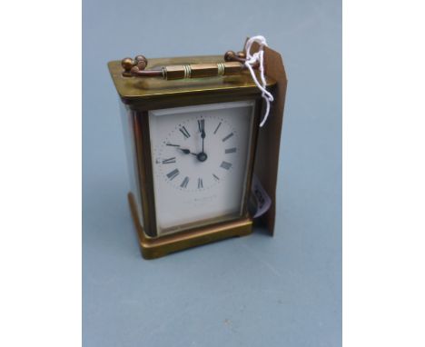 Carriage clock - brass cased John Elliott & Co Cardiff with key 